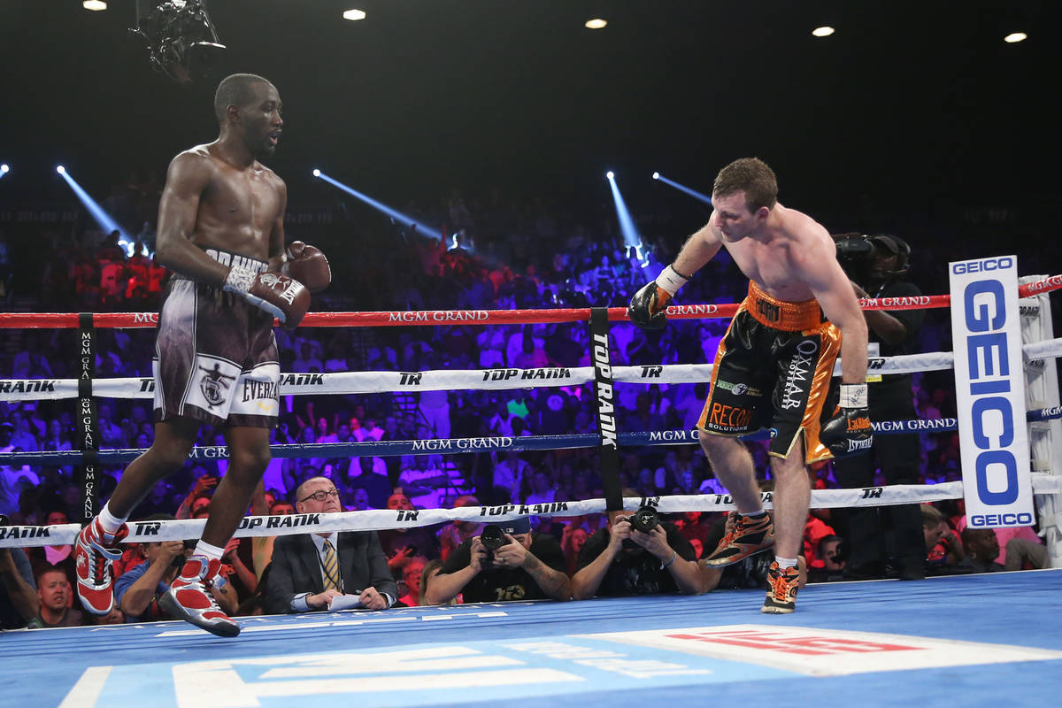 Jeff Horn, right, stumbles against Terence Crawford in the WBO welterweight World Title bout at ...