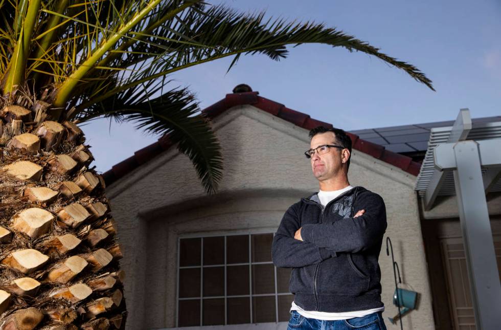 Justin Stephens, a security officer at the federal courthouse in downtown Las Vegas, poses at h ...