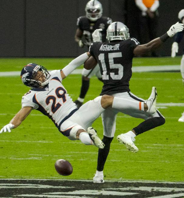 Denver Broncos cornerback Bryce Callahan (29) is unable to catch the ball as Las Vegas Raiders ...