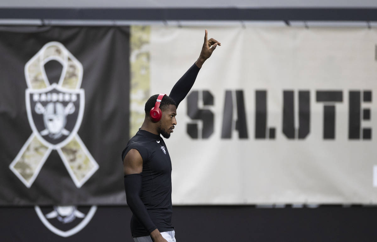 Las Vegas Raiders cornerback Isaiah Johnson points to the sky during warms up before the start ...
