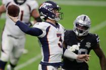 Denver Broncos quarterback Drew Lock (3) throws against against the Las Vegas Raiders during th ...