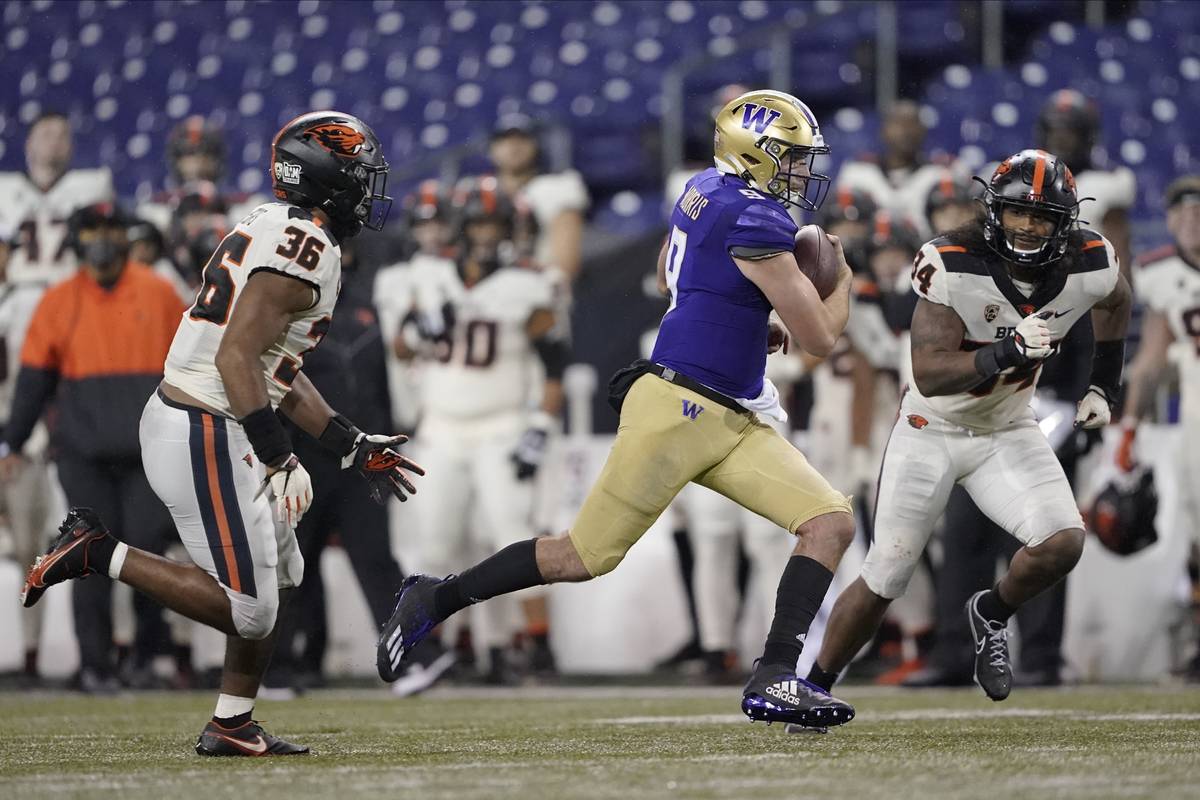 Washington quarterback Dylan Morris in action against Oregon State during an NCAA college footb ...