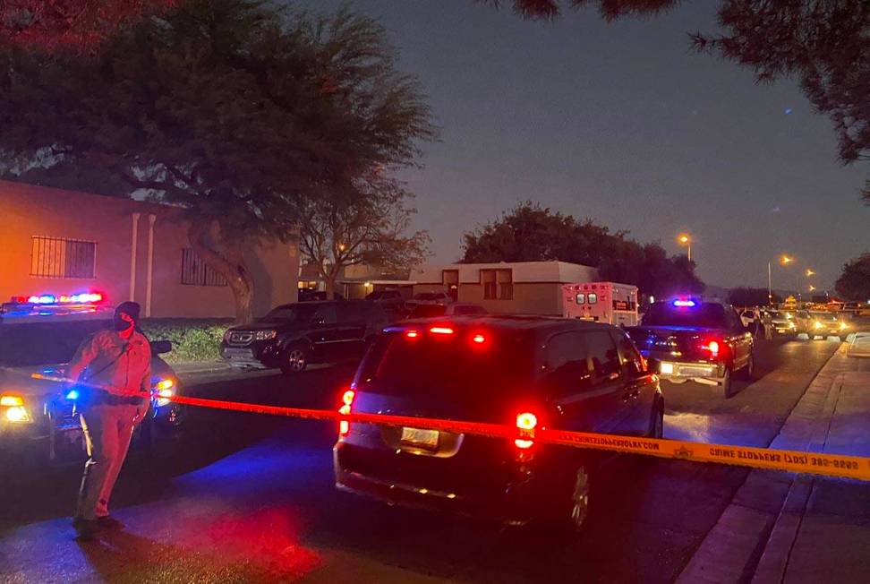 Las Vegas police at the scene of a homicide near East Tropicana Avenue and South Pecos Road on ...