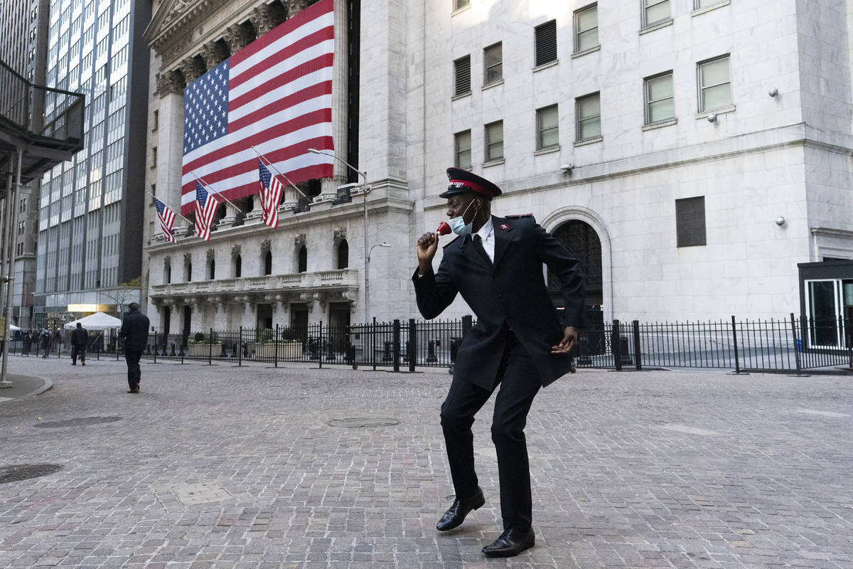 Captain Chaka Watch with the Salvation Army plays lip syncs in front of the New York Stock Exch ...
