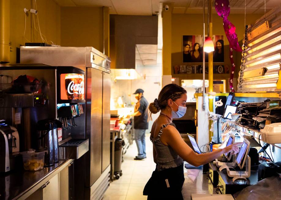 Bianca Alenik places a to-go order in the system at Pasta Shop Ristorante in Henderson, Monday, ...