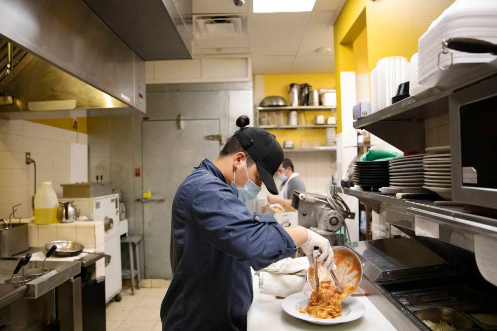 Chef Omar Velazquez plates a pasta dish in the kitchen at Pasta Shop Ristorante in Henderson, , ...