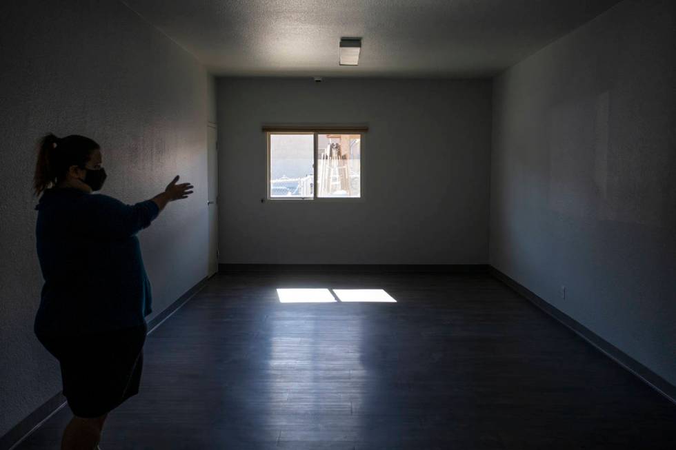 Alyson Martinez, director of programming at Las Vegas Rescue Mission, shows the renovated women ...
