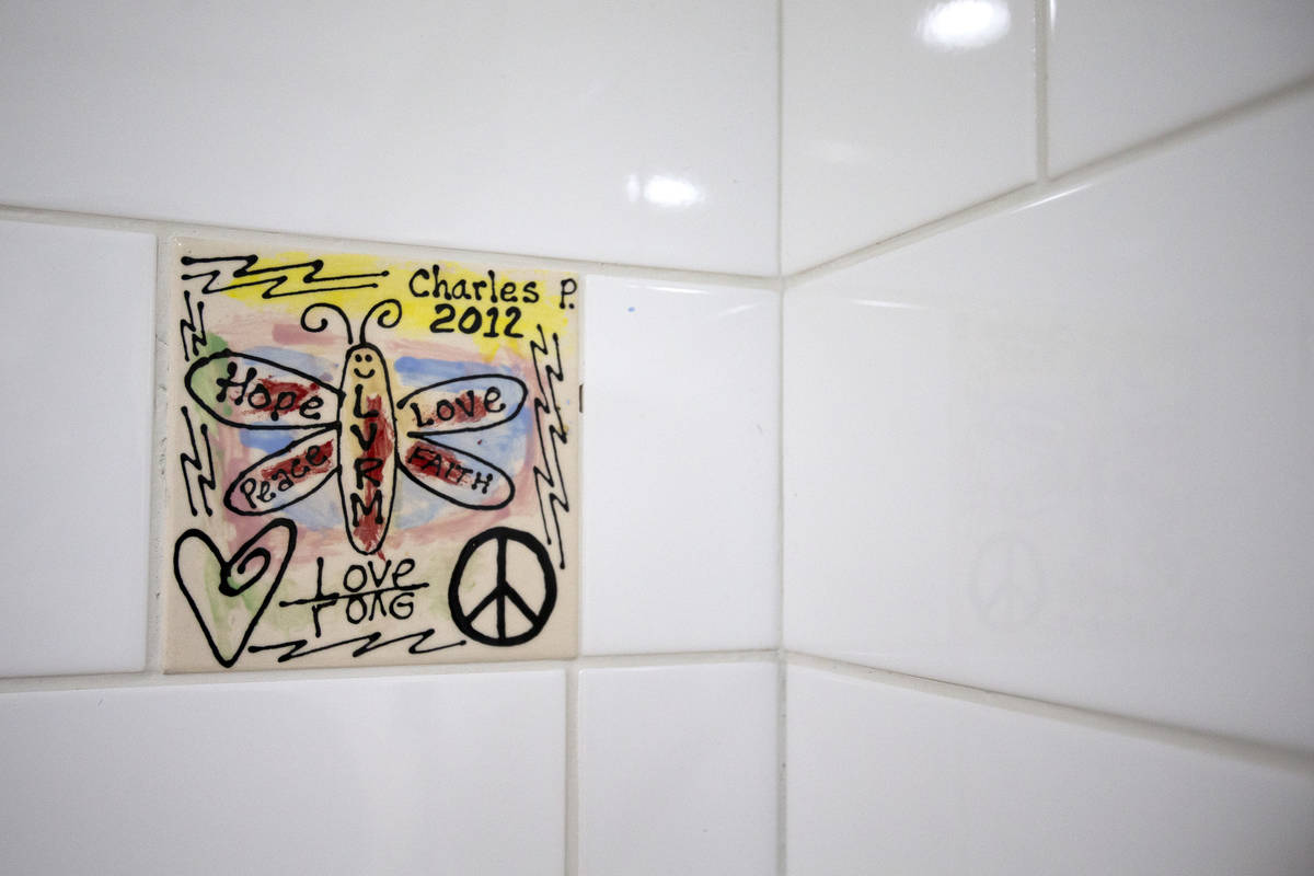A tile made by a former Las Vegas Rescue Mission resident is in the renovated bathroom of the w ...