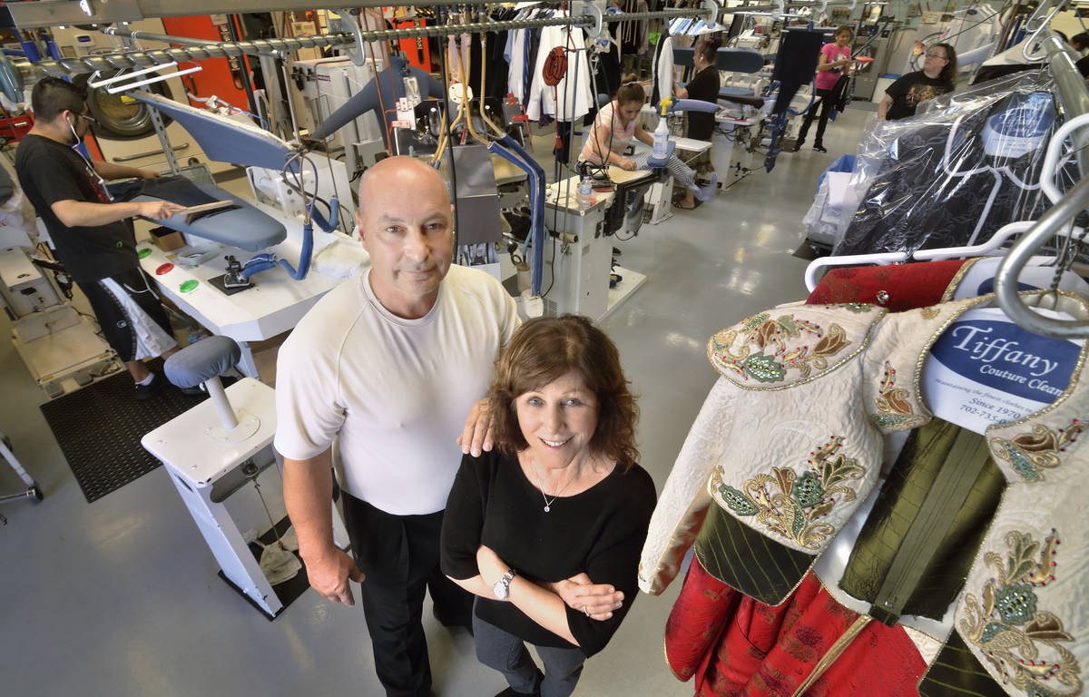 Dan and Judy Del Rossi, owners of Tiffany Couture Cleaners, are shown in the cleaning and press ...