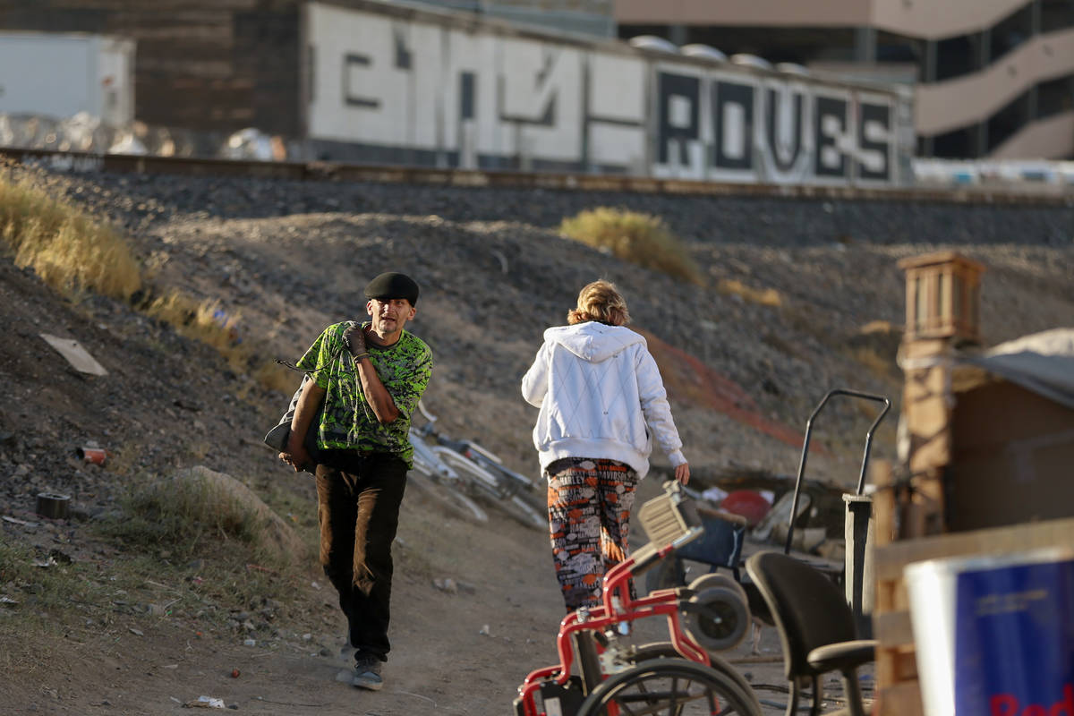 Homeless veteran Michael Jason Michael goes to work after checking in with the Metropolitan Pol ...