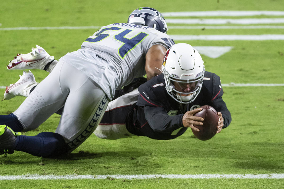 Arizona Cardinals quarterback Kyler Murray (1) dives in for a touchdown against Seattle Seahawk ...