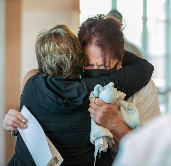 Lauren Prescia's grandmother Lois Prescia, left, and mother Kelly Nyman, hug after Lauren Presc ...