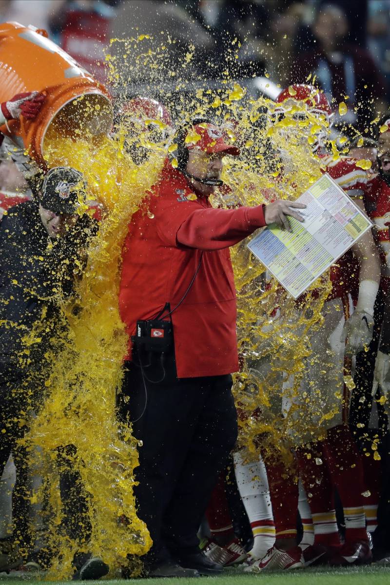 Kansas City Chiefs head coach Andy Reid is doused on the sideline during the second half of the ...