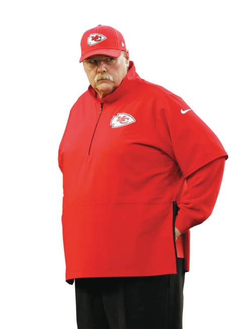 Kansas City Chiefs head coach Andy Reid watches before the NFL Super Bowl 54 football game betw ...