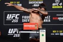 Mike Perry poses on the scale during the UFC 255 weigh-in at UFC APEX on November 20, 2020, in ...