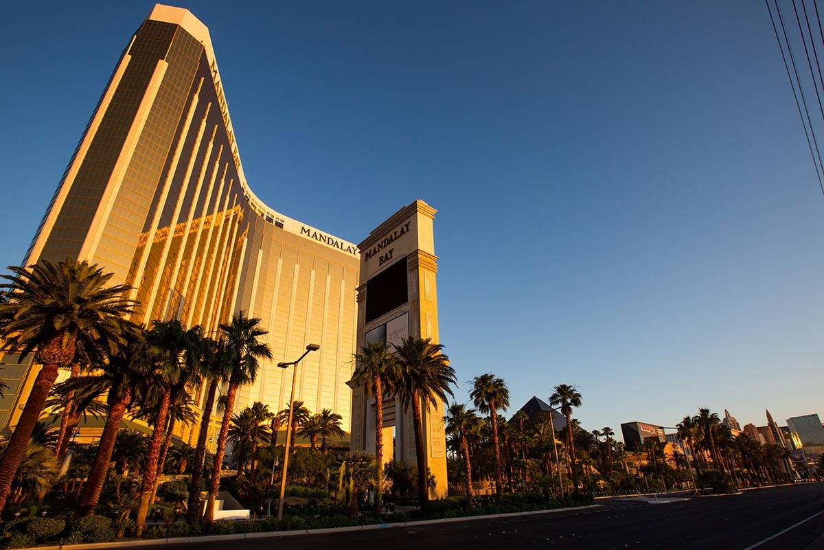 The sunrise reflects off Mandalay Bay on the Las Vegas Strip as casinos prepare to reopen on Th ...