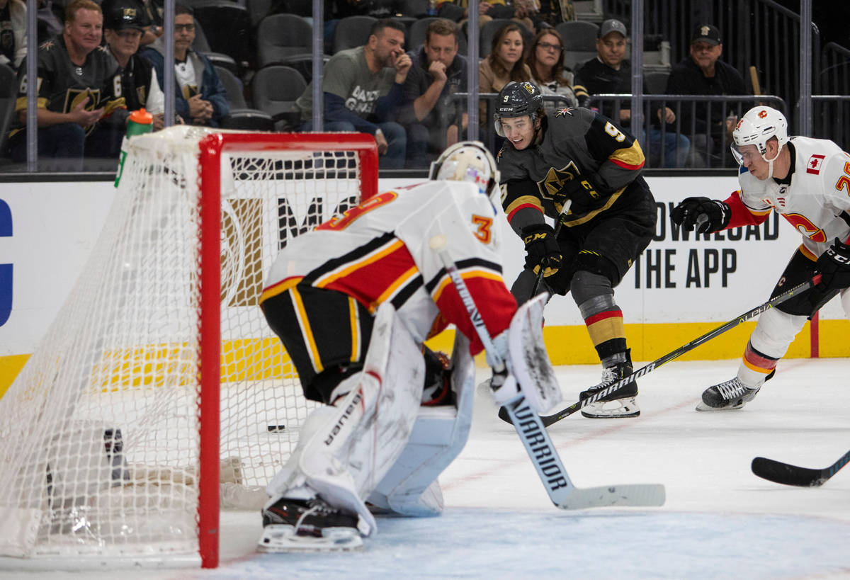 Golden Knights center Cody Glass (9) makes a shot on goal, and scores, during the third period ...