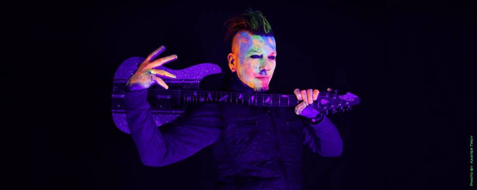 DJ Ashba is shown in a promotional photo for "Hypnotic," featuring Cali Tucker, an EDM track th ...