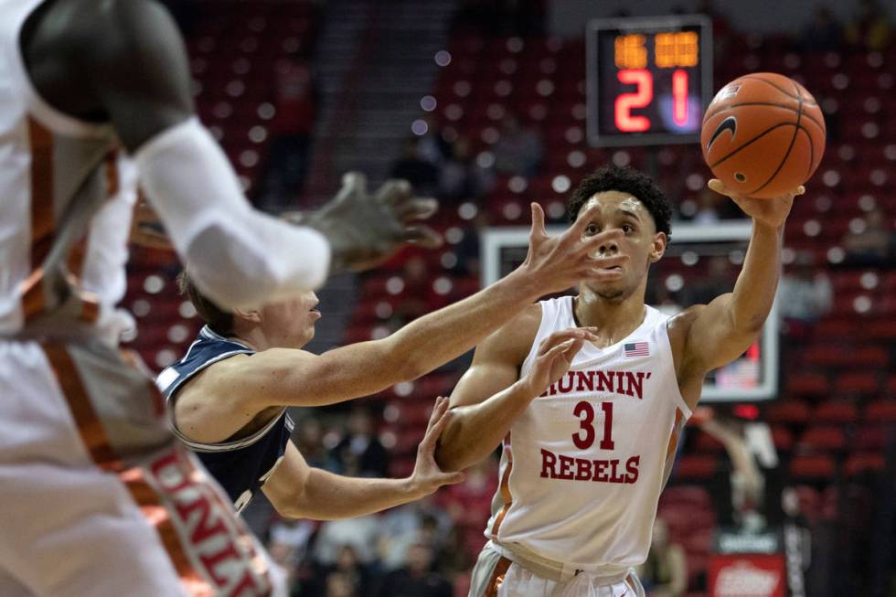 UNLV's guard Marvin Coleman (31) looks to pass to a teammate during the first half of the game ...