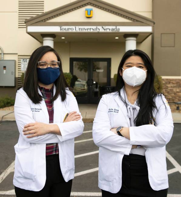 Toro University Nevada students, Stephanie Bernardo, left, and Kylie Zeng pose for a photo, on ...