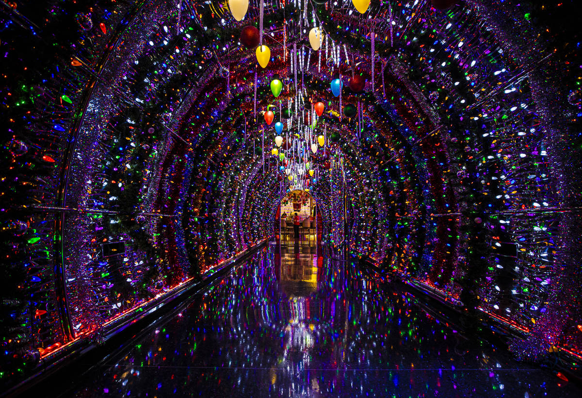 Thousands of bulbs light up the hallway leading to the main lounge at Red Rock Resort's Christm ...