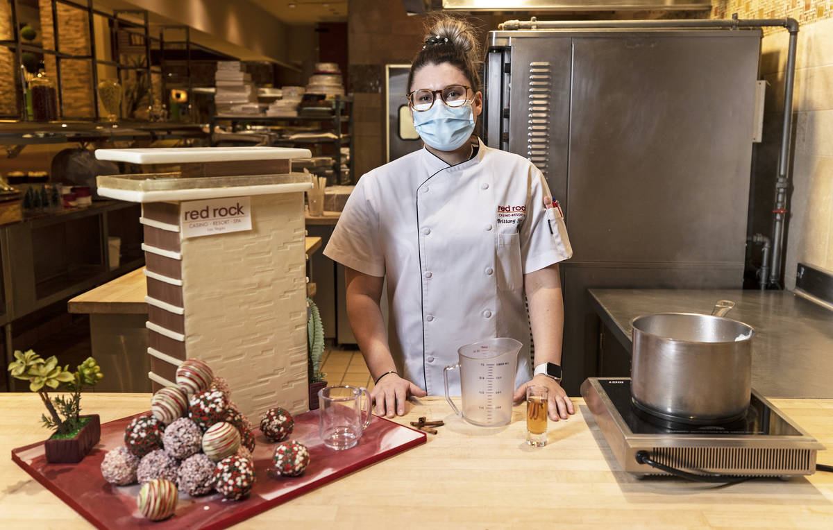 Pastry chef Brittany Simmons prepares to make a hot cocoa bomb cocktail on Monday, Nov. 23, 202 ...