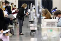 Recount observers watch ballots during a Milwaukee hand recount of Presidential votes at the Wi ...