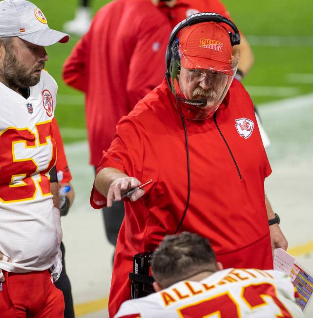 Kansas City Chiefs head coach Andy Reid has a few words for Kansas City Chiefs offensive guard ...