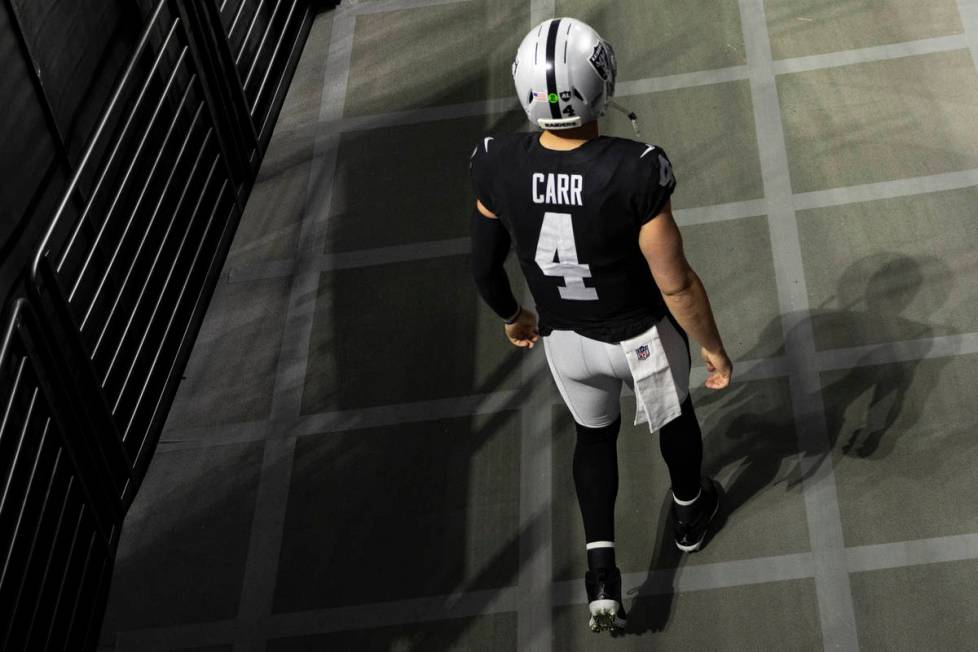 Las Vegas Raiders quarterback Derek Carr (4) takes the field during warms ups before the start ...