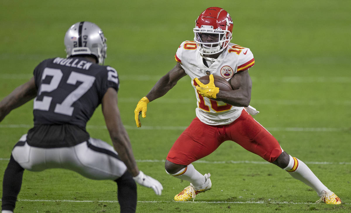 Kansas City Chiefs wide receiver Tyreek Hill (10) makes a move up field against Las Vegas Raide ...