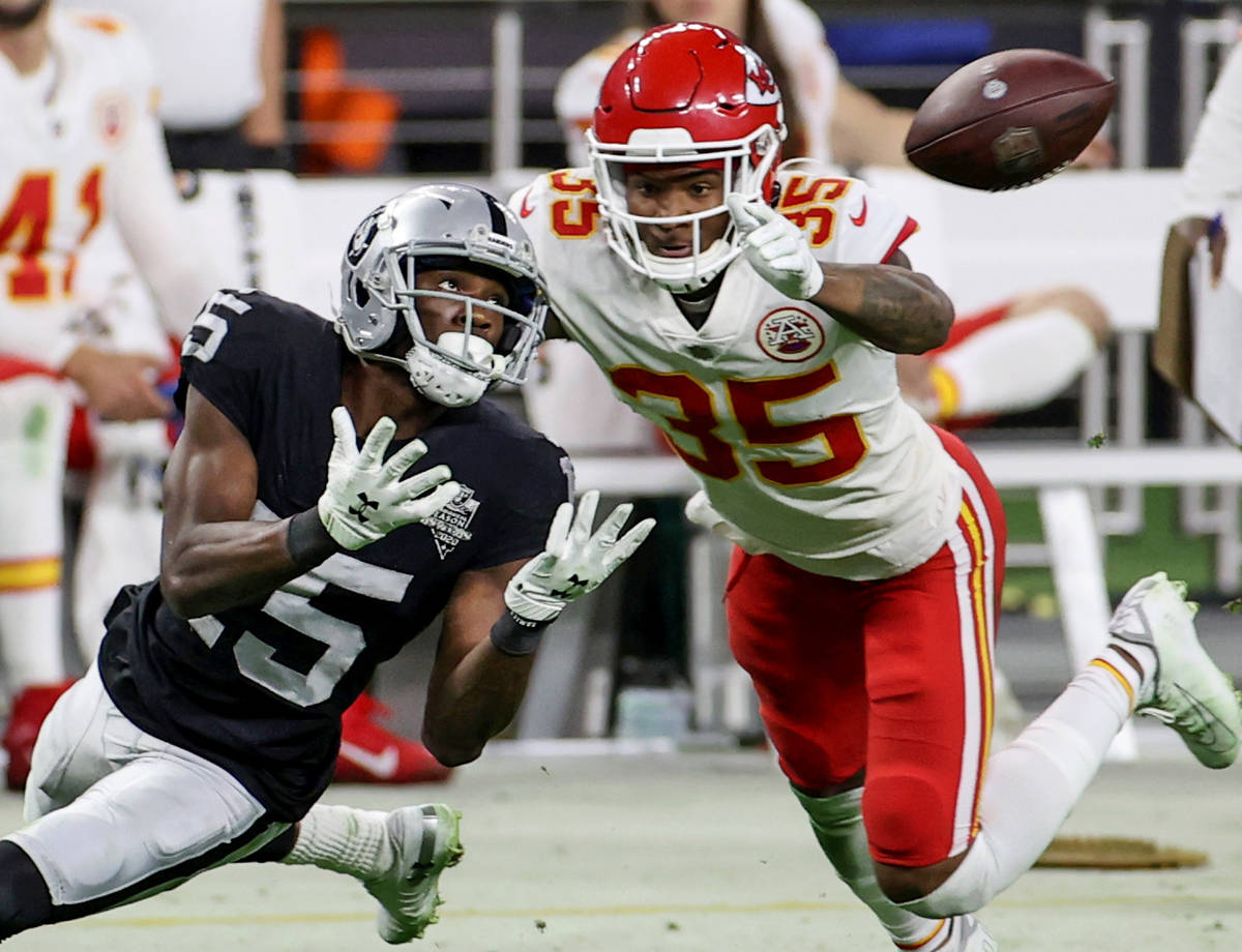 Las Vegas Raiders wide receiver Nelson Agholor (15) attempts to catch a pass in front of Kansas ...