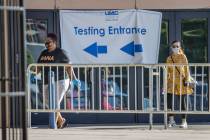 People enter the free walk-up COVID-19 testing offered at Cashman Center in partnership with Un ...