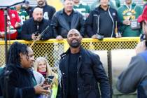 Former Raiders and Green Bay Packers cornerback Charles Woodson meets with fans before an NFL g ...