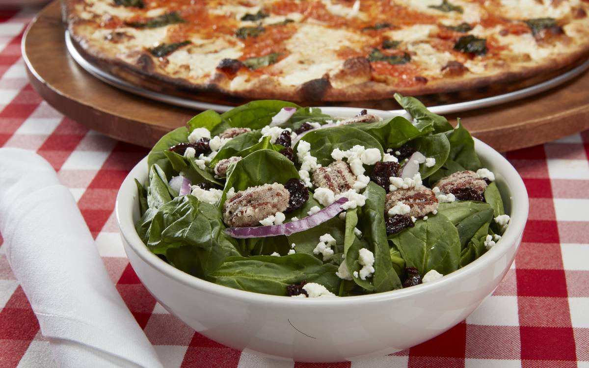 Chicken al la vodka pizza and spinach-pecan salad at Grimaldi's Coal Brick-Oven Pizzeria. (Grim ...
