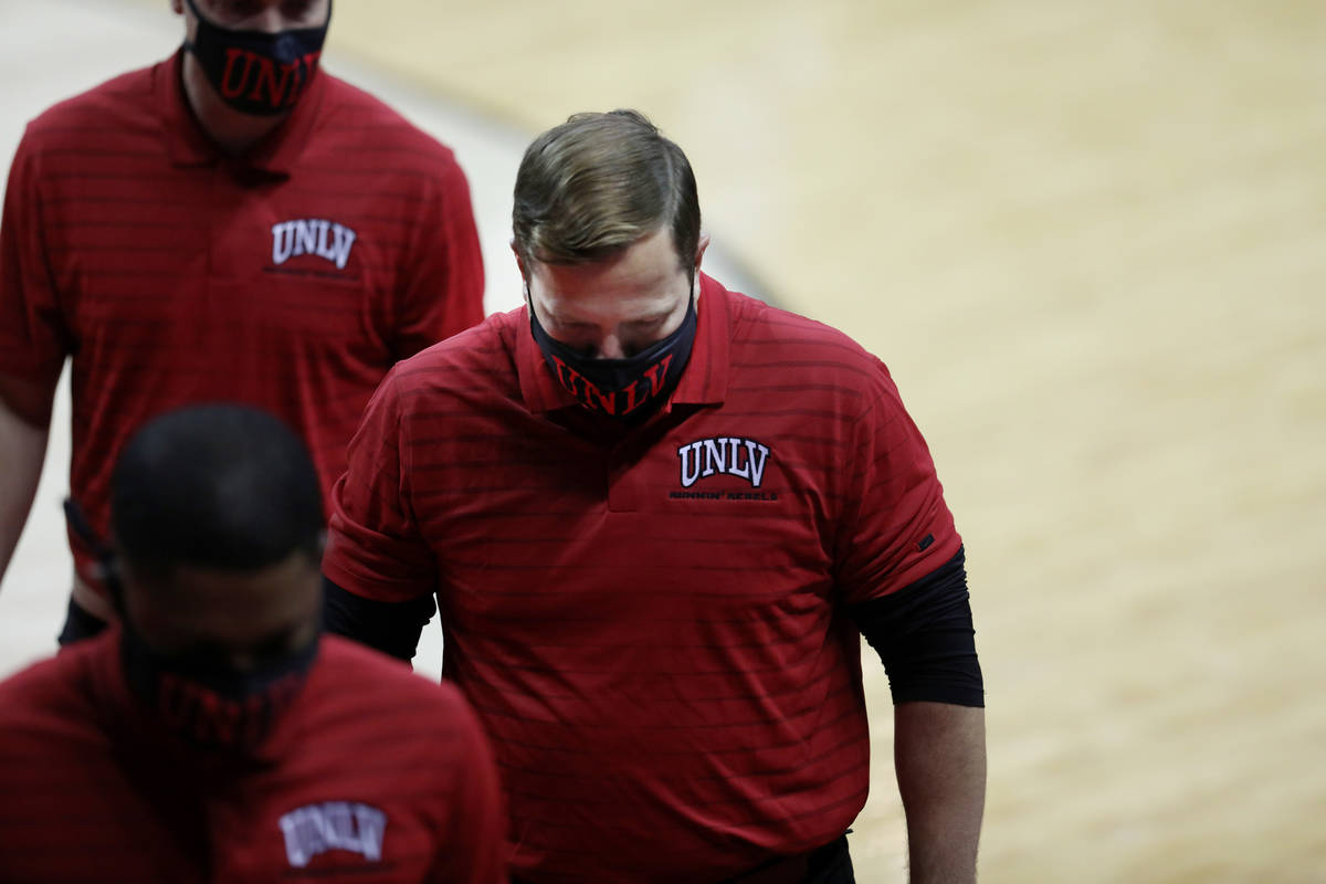 UNLV Rebels head coach T. J. Otzelberger exits the court after the first half playing Montana S ...