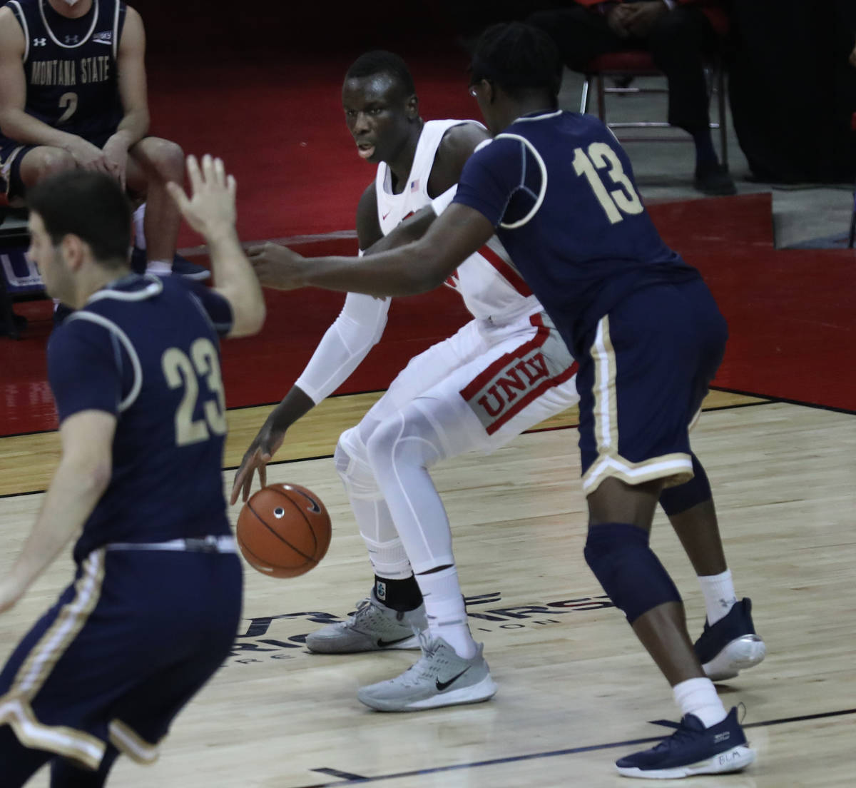 UNLV Rebels forward Cheikh Mbacke Diong (34) is pressured by Montana State Bobcats forward Jubr ...