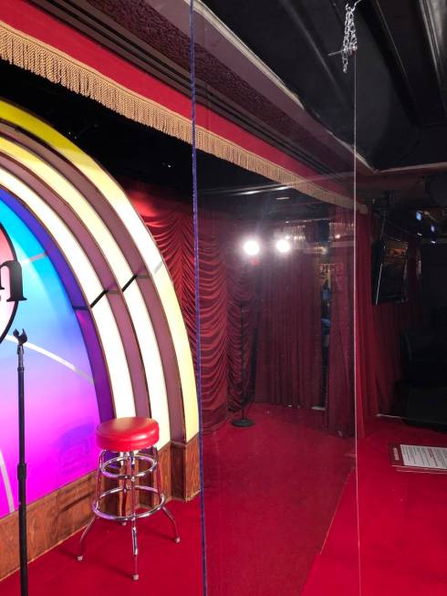 The stage at the Laugh Factory at the Tropicana, with a plexiglass barrier, as it is set for An ...