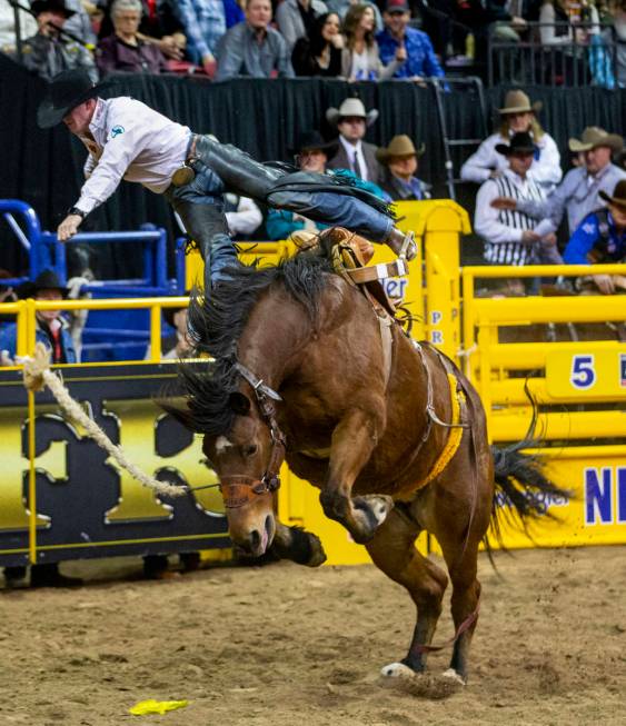 Sterling Crawley of Stephenville, Texas, gets tossed off in Saddle Bronc Riding at the tenth go ...