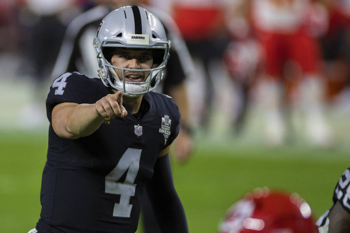 Las Vegas Raiders quarterback Derek Carr (4) calls an audible in the third quarter during an NF ...