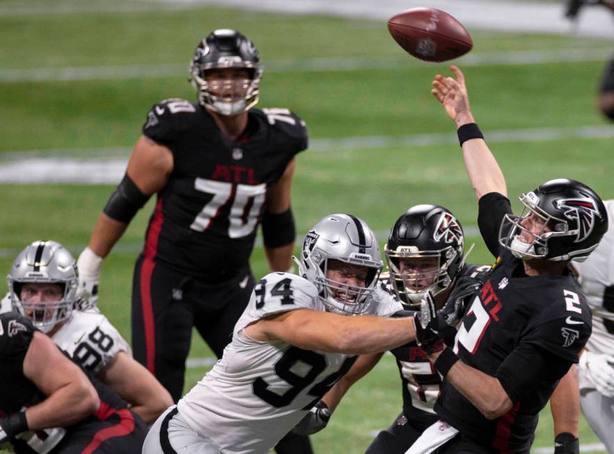 Las Vegas Raiders defensive end Carl Nassib (94) pressures Atlanta Falcons quarterback Matt Rya ...