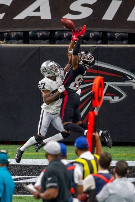 Las Vegas Raiders cornerback Trayvon Mullen (27) breaks up a pass intended for Atlanta Falcons ...