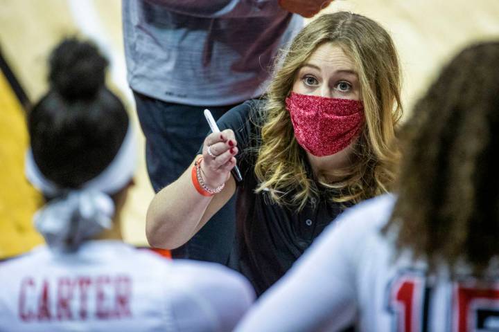 UNLV coach Lindy La Rocque, center, shown Dec. 5, guided the Lady Rebels to a 54-46 win over Wy ...