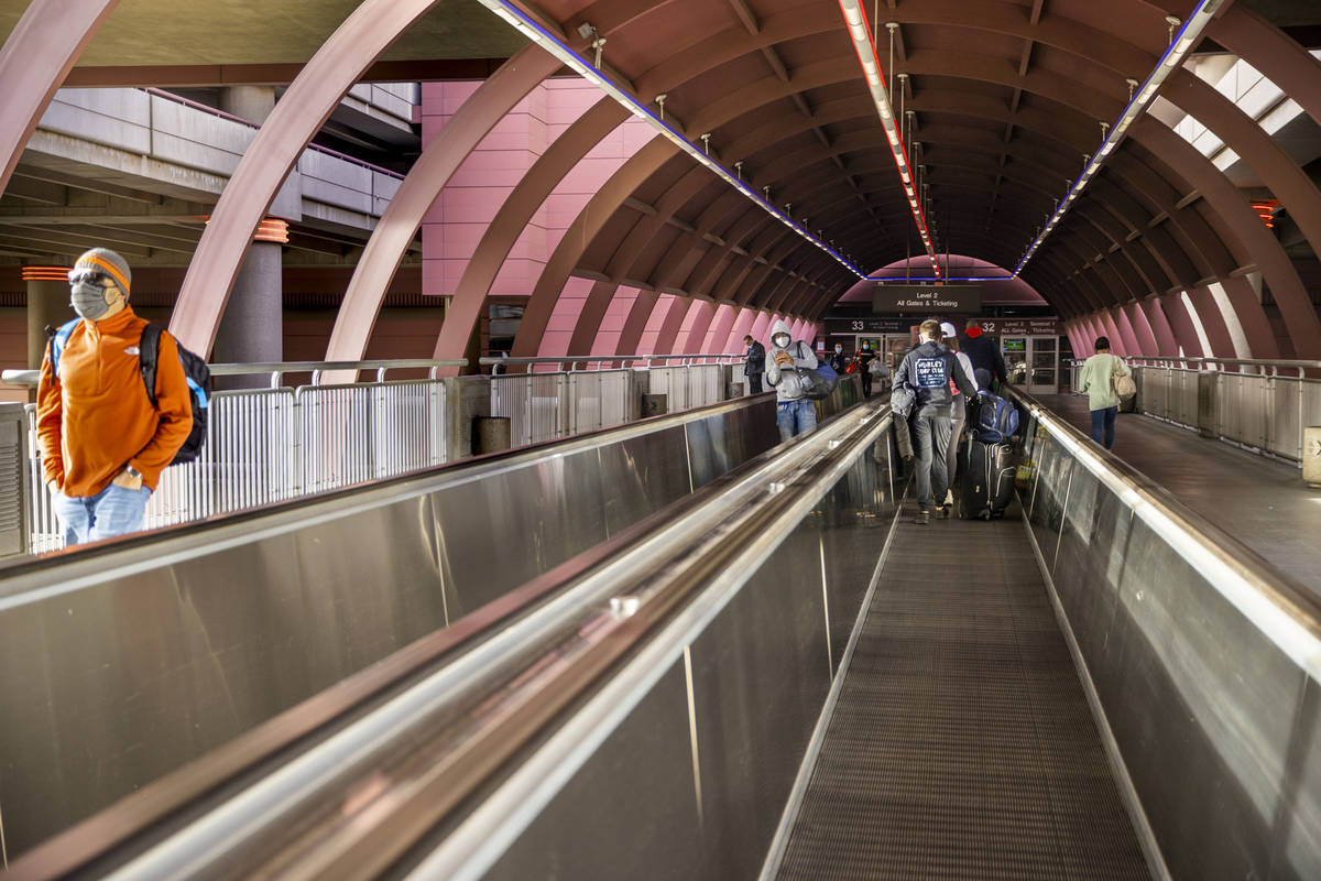 People come and go as holiday travel at McCarran International Airport continues on Thursday, D ...