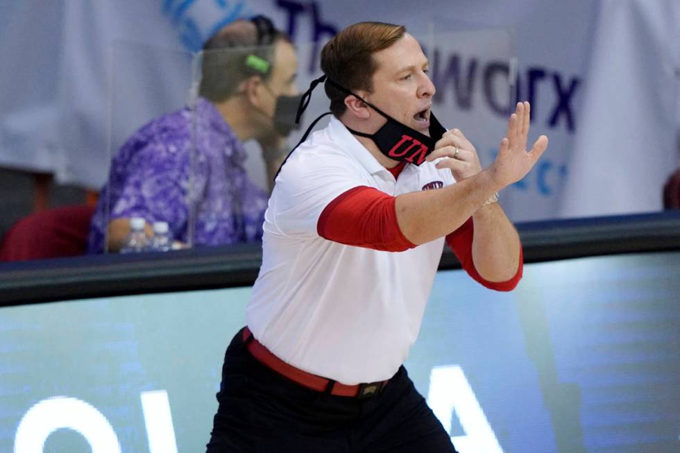 UNLV head coach T.J. Otzelberger directs his team in the first half of an NCAA college basketba ...