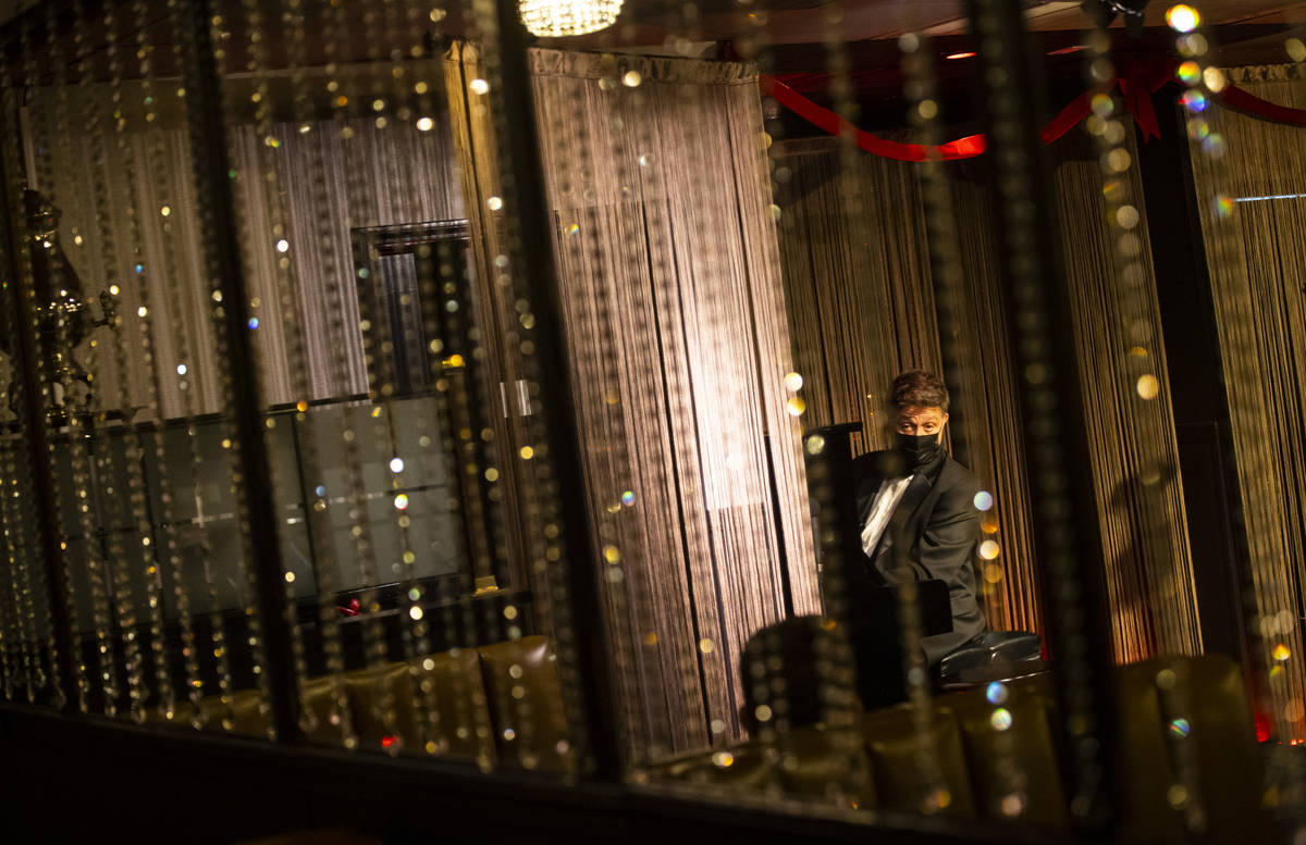 Keith Thompson plays piano during rehearsal for "A Vegas Room Christmas" at The Vegas ...