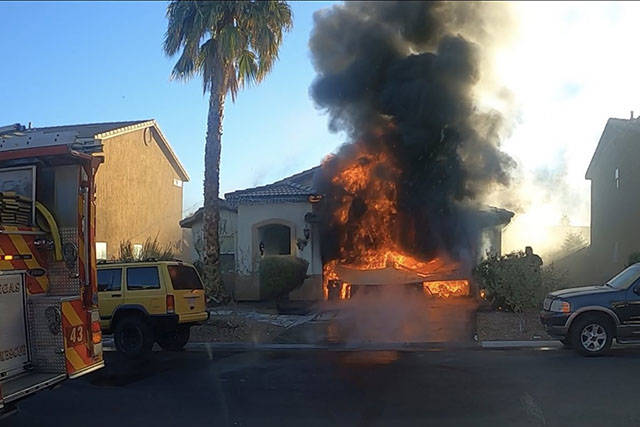Firefighters respond to a fire at at 2712 Rosarito St. on Tuesday, Dec. 1, 2020. (Las Vegas Fir ...