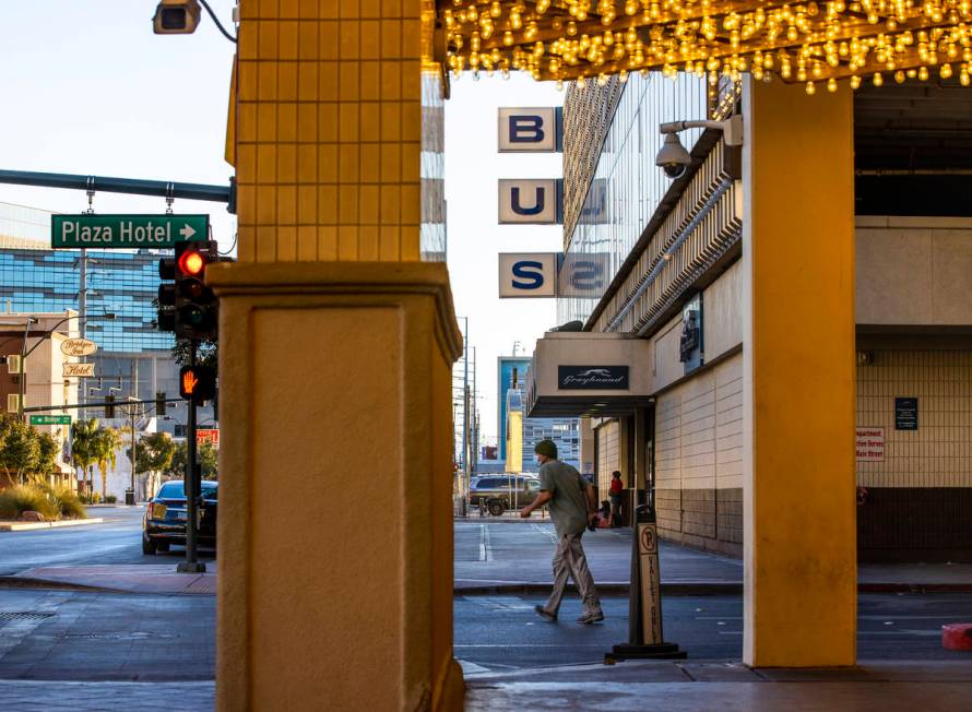 A pedestrian walks along as the Plaza Hotel and Casino announces it will redevelop a building t ...