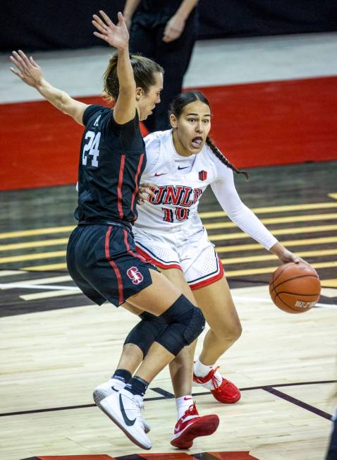 UNLV Lady Rebels guard Jacinta Buckley (10, right) looks to drive on Stanford Cardinal guard La ...