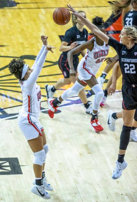 UNLV Lady Rebels guard Jasmine Singleton (2, left) has a shot attempt blocked by Stanford Cardi ...