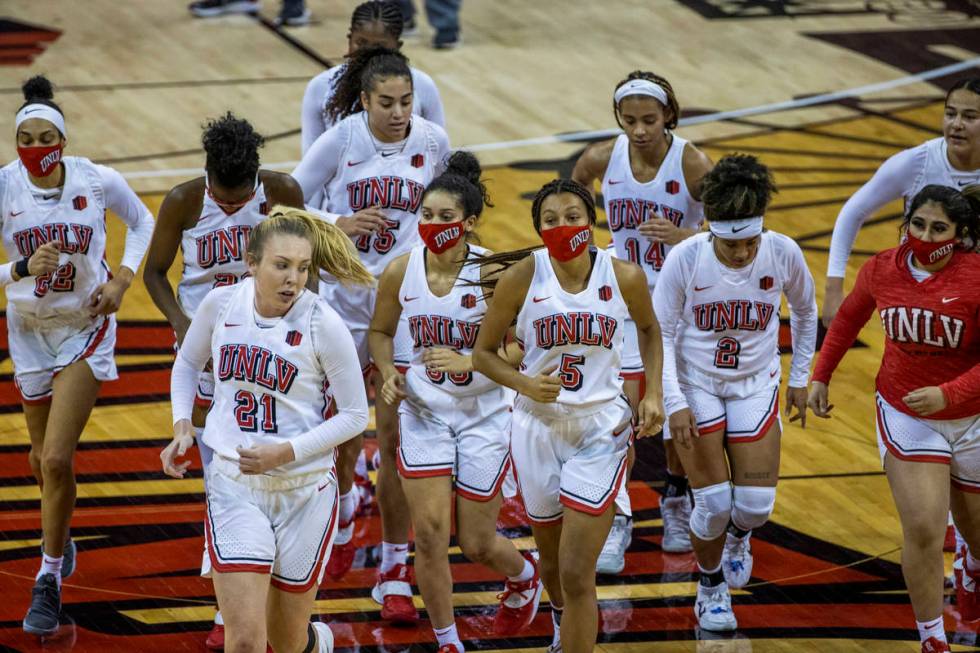 UNLV Lady Rebels' players leave the court after losing to the Stanford Cardinals 101-54 followi ...